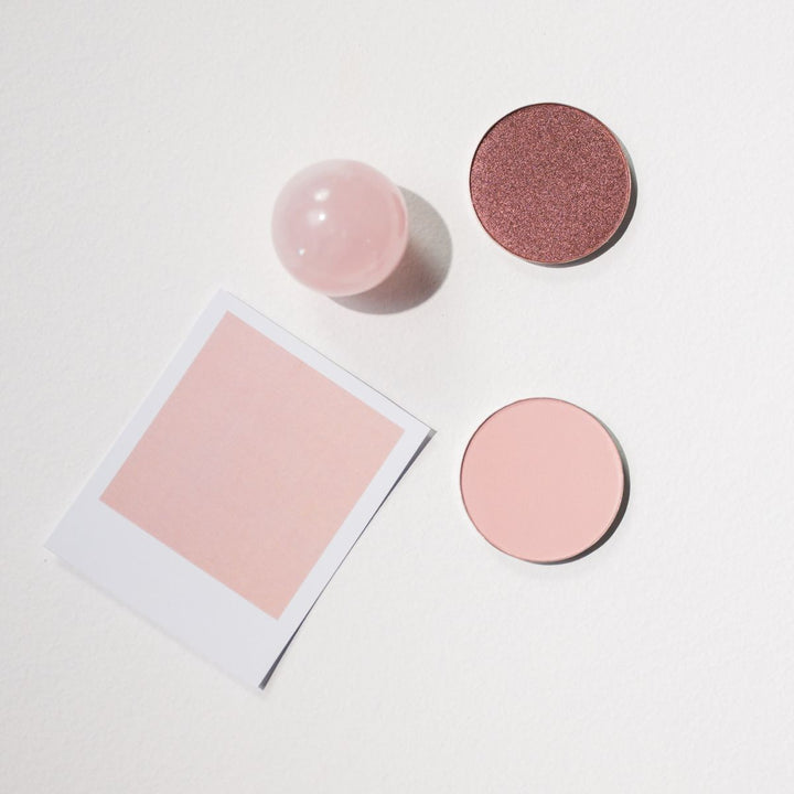 Minimal pink makeup palette and powders